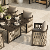 N2 dark teak outdoor furniture with modern rattan rope detail in luxury property with outdoor dining table set